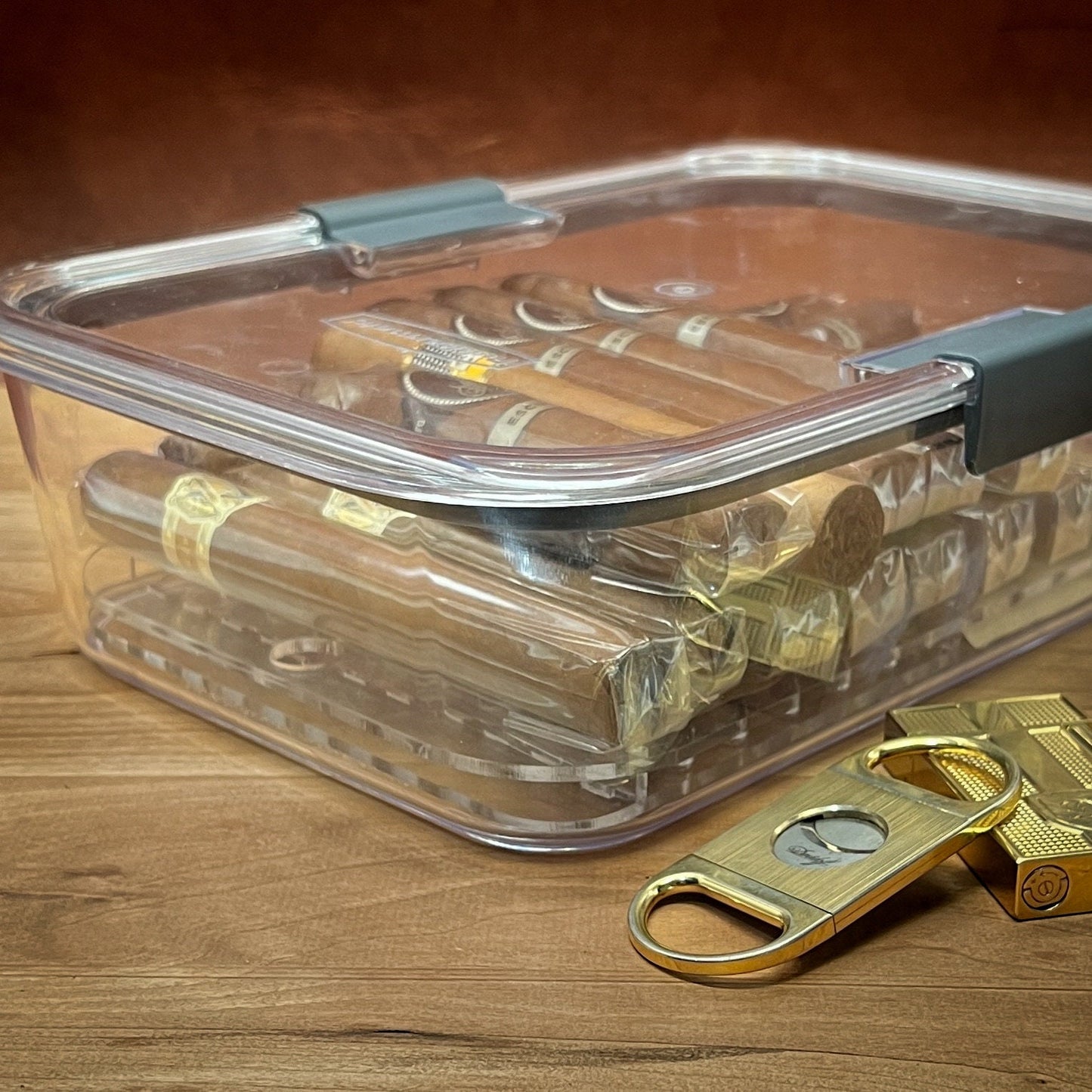 Cigars and accessories in tupperdor with precious spacer.