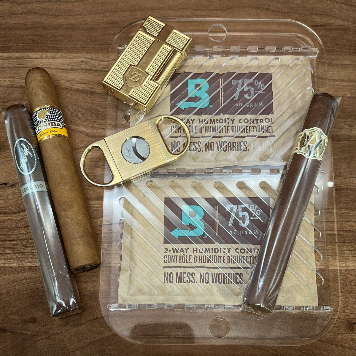 Precious Spacer with 75% Boveda packs inside with cigars and accessories.